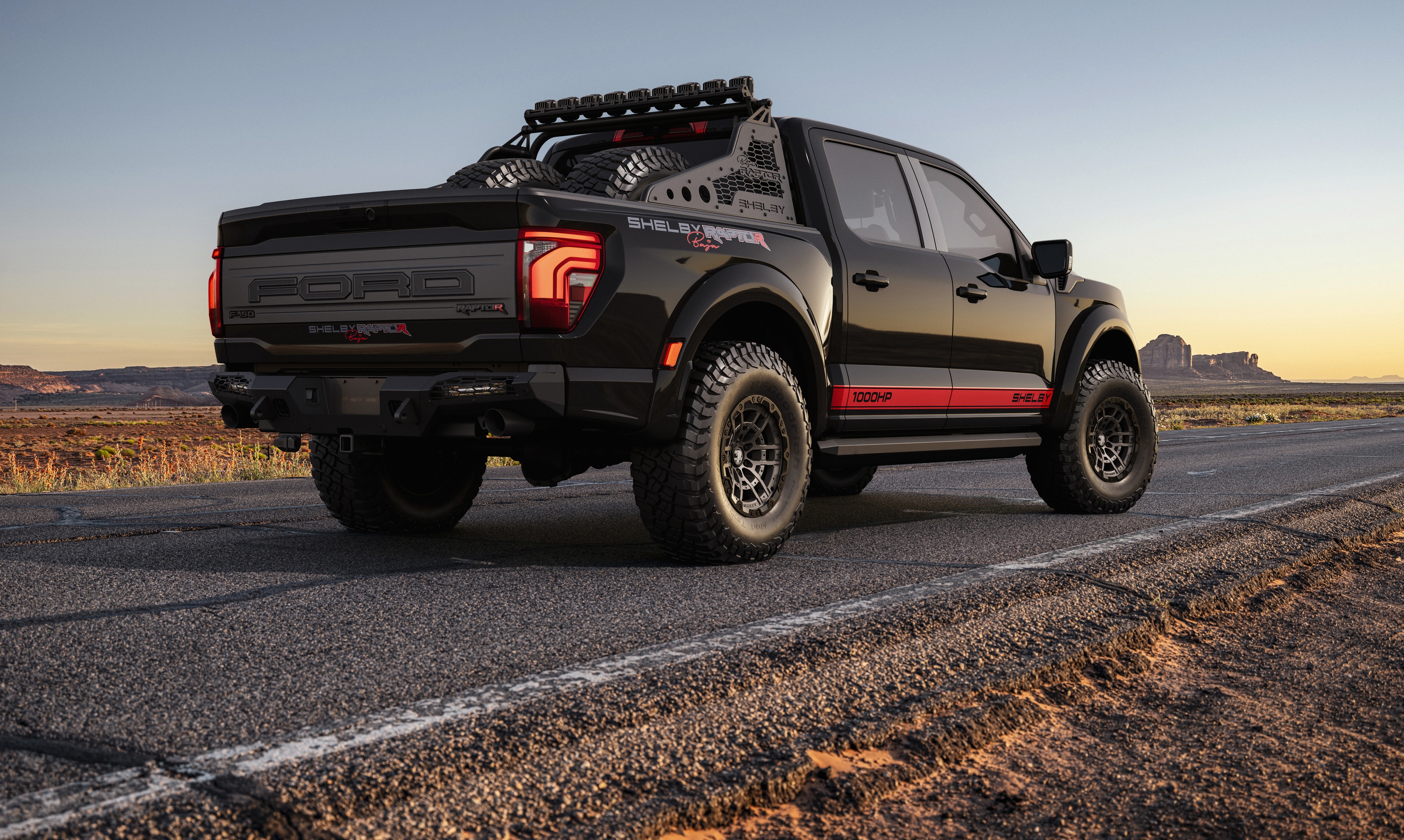 2026 Shelby Raptor R black red rear 3/4 desert sunset