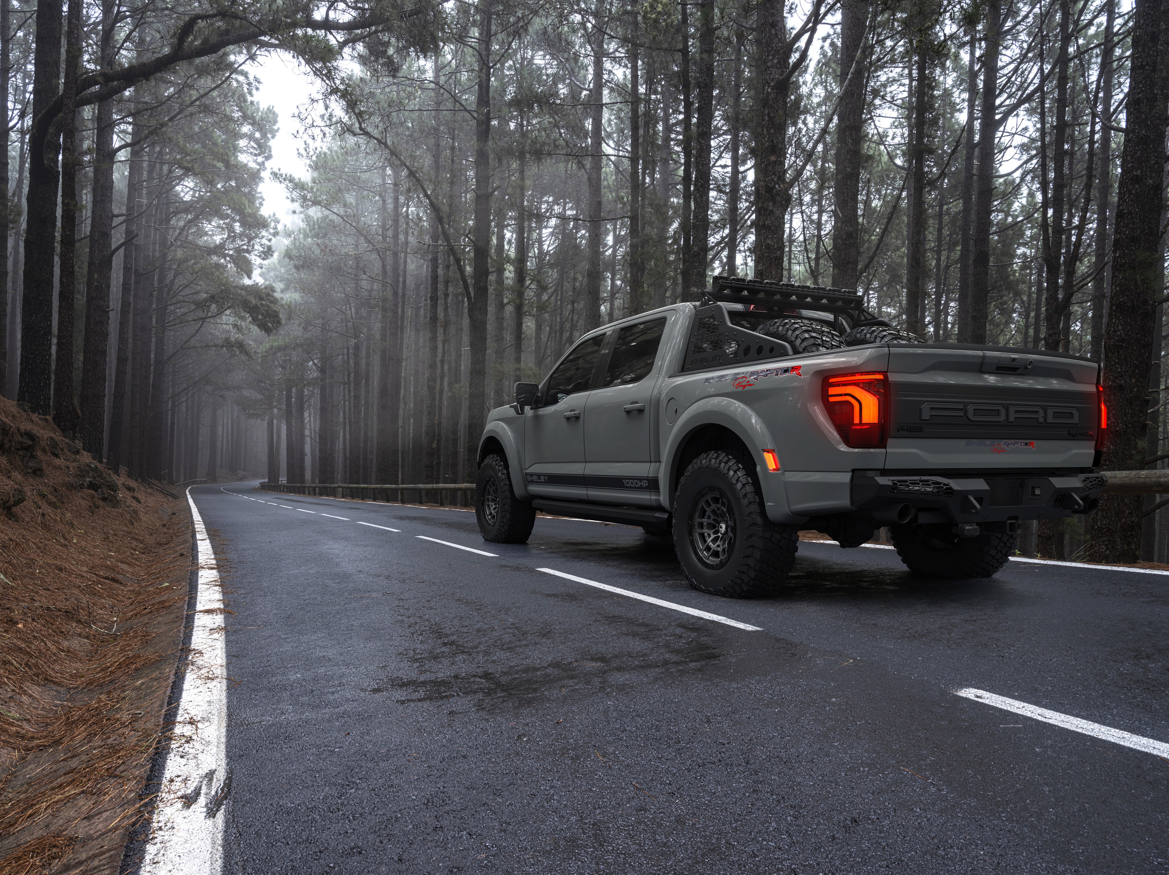 2026 Shelby Raptor R silver rear misty forest road