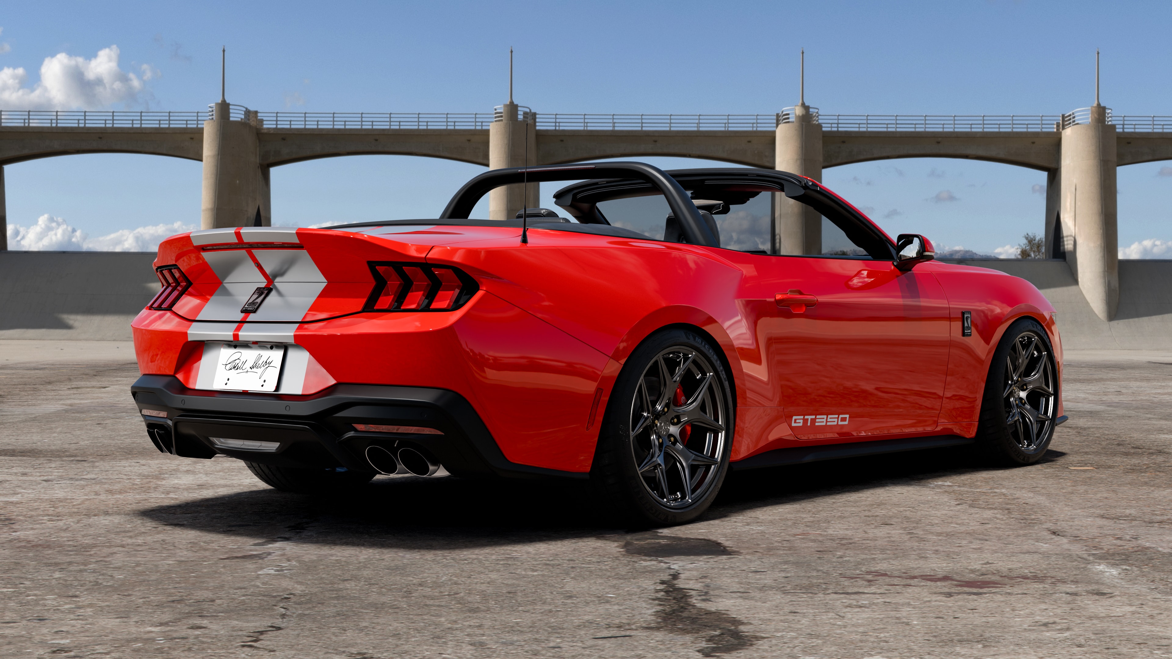 2026 Shelby GT350 red convertible rear bridge outdoor